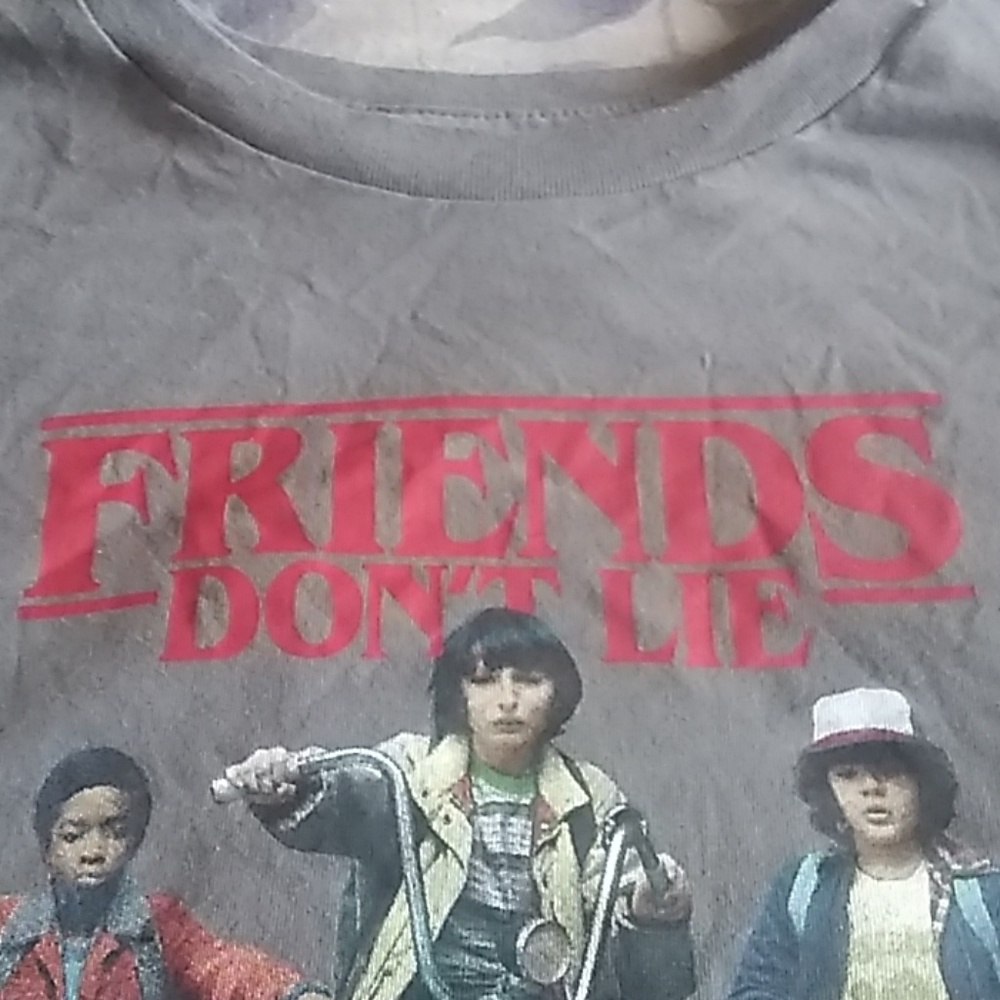 A long sleeve " Stranger Things" shirt